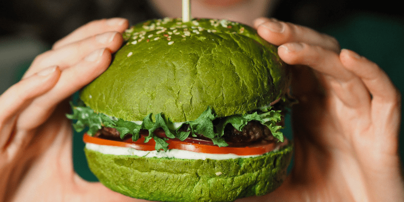 Woman Eating a Burger | Emotional Eating Woman Eating a Burger | Emotional Eating