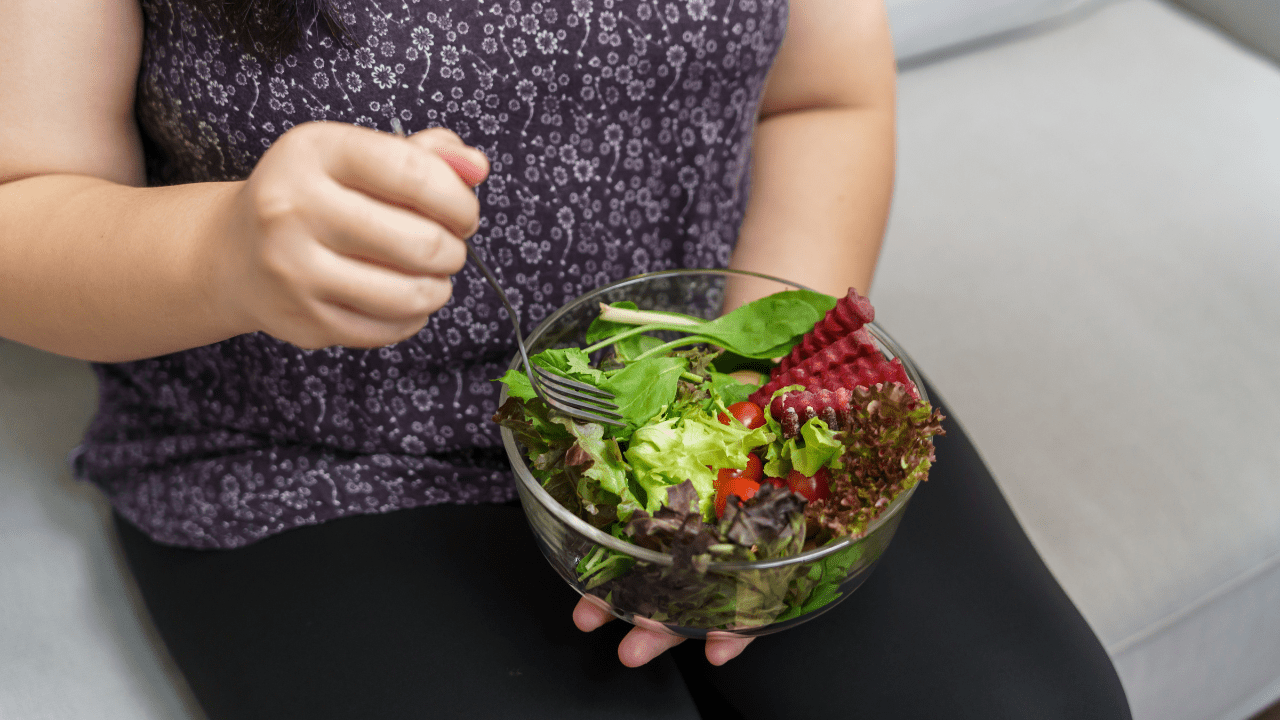 Woman Dieting for Weight Loss - Eating Salad