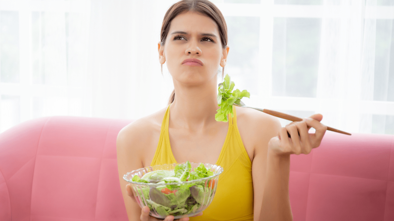 Woman Eating Kale Salad - Natural Fat Loss Woman Eating Kale Salad - Natural Fat Loss
