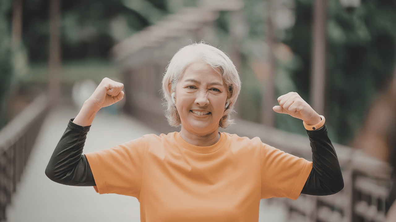 Woman Showing Muscle 
