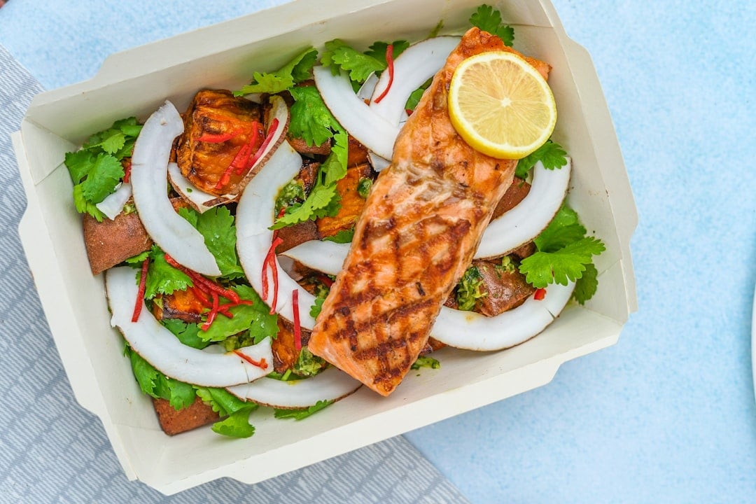 Photo by Toa Heftiba vegetable salad with grilled salmon